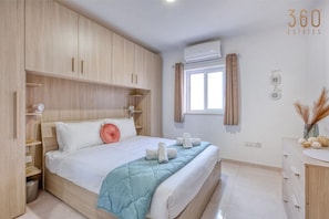 2 bedrooms, desk, iron/ironing board, travel crib