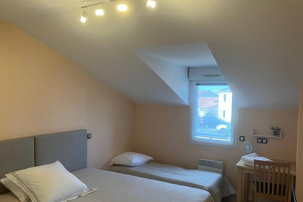 Family Triple Room, City View | Blackout curtains, iron/ironing board, free WiFi
