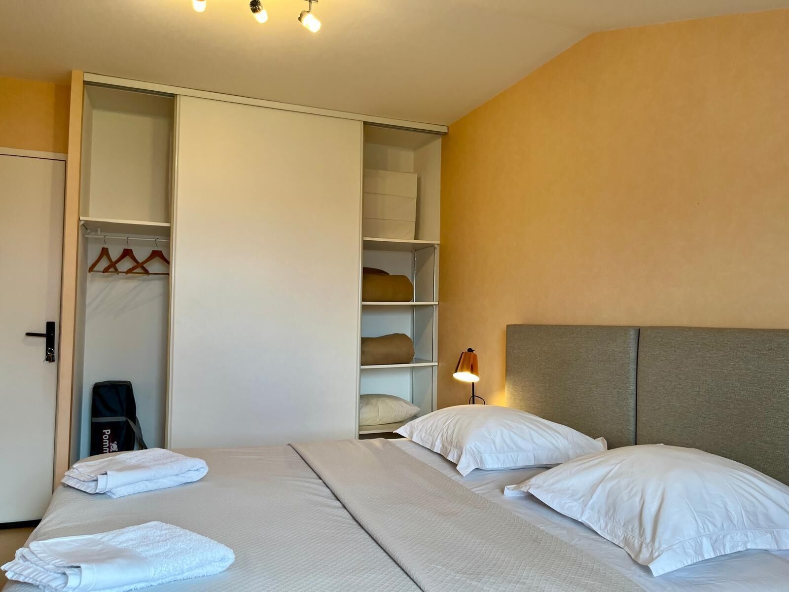 Family Triple Room, City View | Desk, laptop workspace, blackout drapes, iron/ironing board