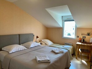 Family Triple Room, City View | Desk, laptop workspace, blackout curtains, iron/ironing board - Greg House 49 - Chambres d'Hôtes (Beaupréau-en-Mauges)