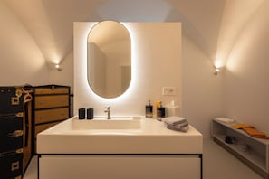 Hair dryer, bidet, towels, soap