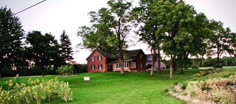 The Walnut Grove Estate is a spacious and cozy farm house. 50 Acres of privacy