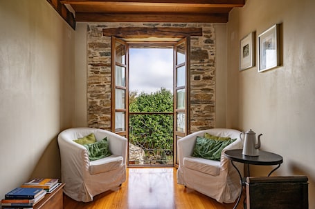 Living area. Room or Corridor with Private Balcony and Mountain Views
