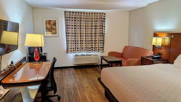 Laptop workspace, blackout drapes, soundproofing, iron/ironing board