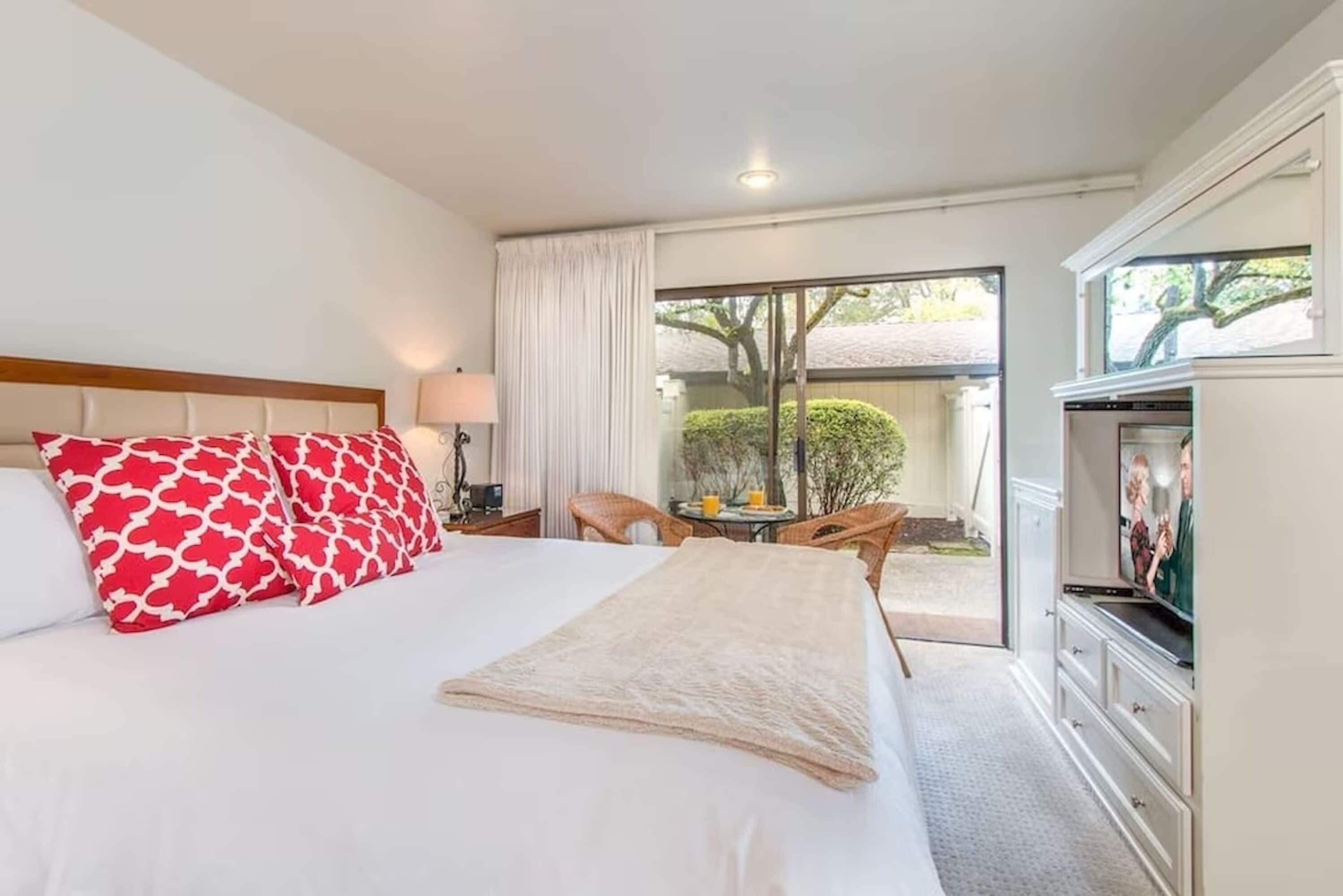 Desk, laptop workspace, blackout curtains, iron/ironing board