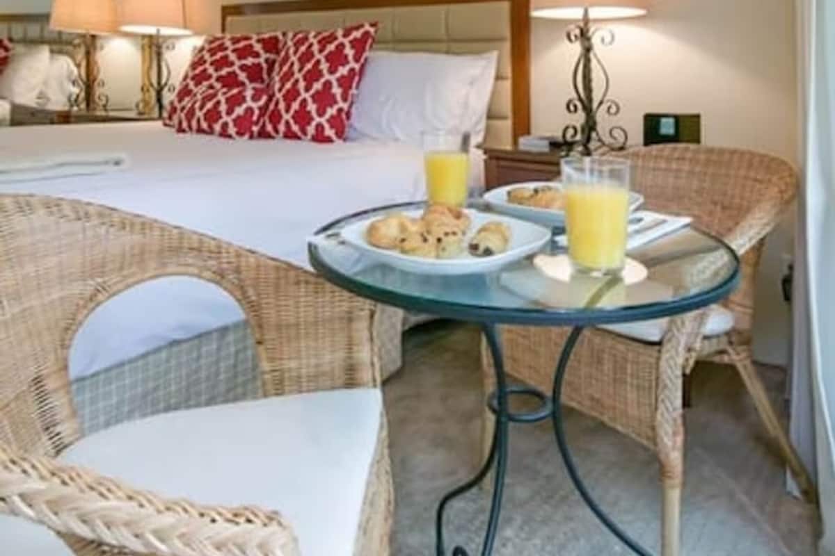 Exclusive Condo, Courtyard View | Desk, laptop workspace, iron/ironing board, free WiFi