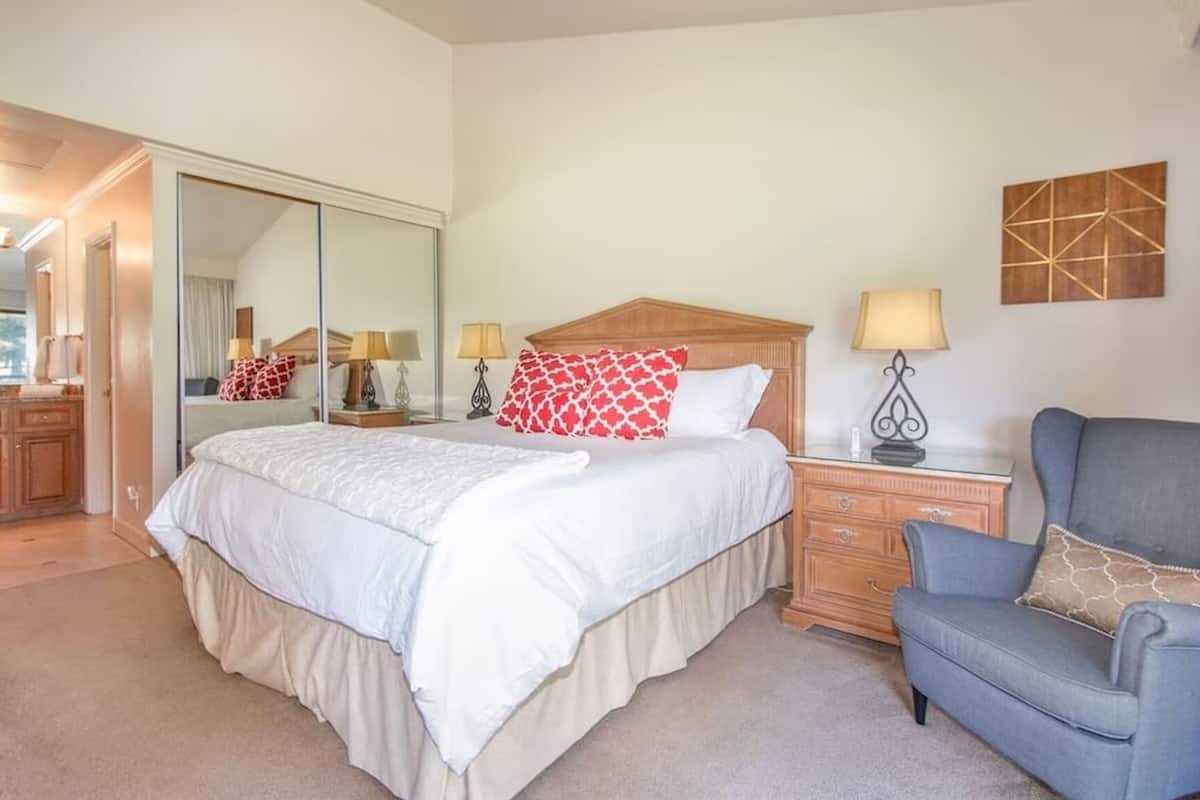 Desk, laptop workspace, blackout curtains, iron/ironing board