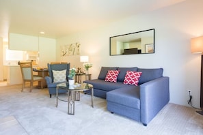Exclusive Condo, Golf View | Living area | 55-inch flat-screen TV with digital channels