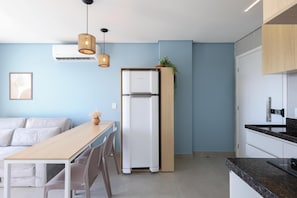 Family Apartment | Private kitchen | Full-size fridge, microwave, stovetop, cookware/dishes/utensils