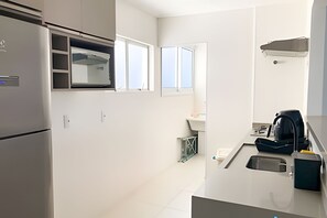 Fridge, microwave, oven, cookware/dishes/utensils