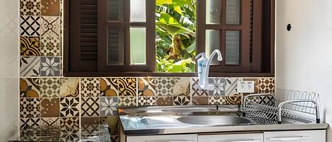 Fridge, oven, cookware/dishes/utensils