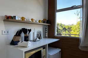 Interior - Saint Louis | Charming suite 4 minutes from the center (Campos do Jordão)