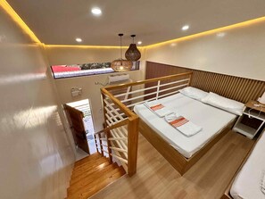 1 dormitorio, escritorio, tabla de planchar con plancha y wifi