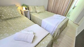 2 habitaciones, tabla de planchar con plancha, wifi y ropa de cama