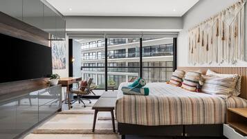 Deluxe Apartment | Peralatan tempat tidur premium, gebar bulu kapas, tilam berlapik