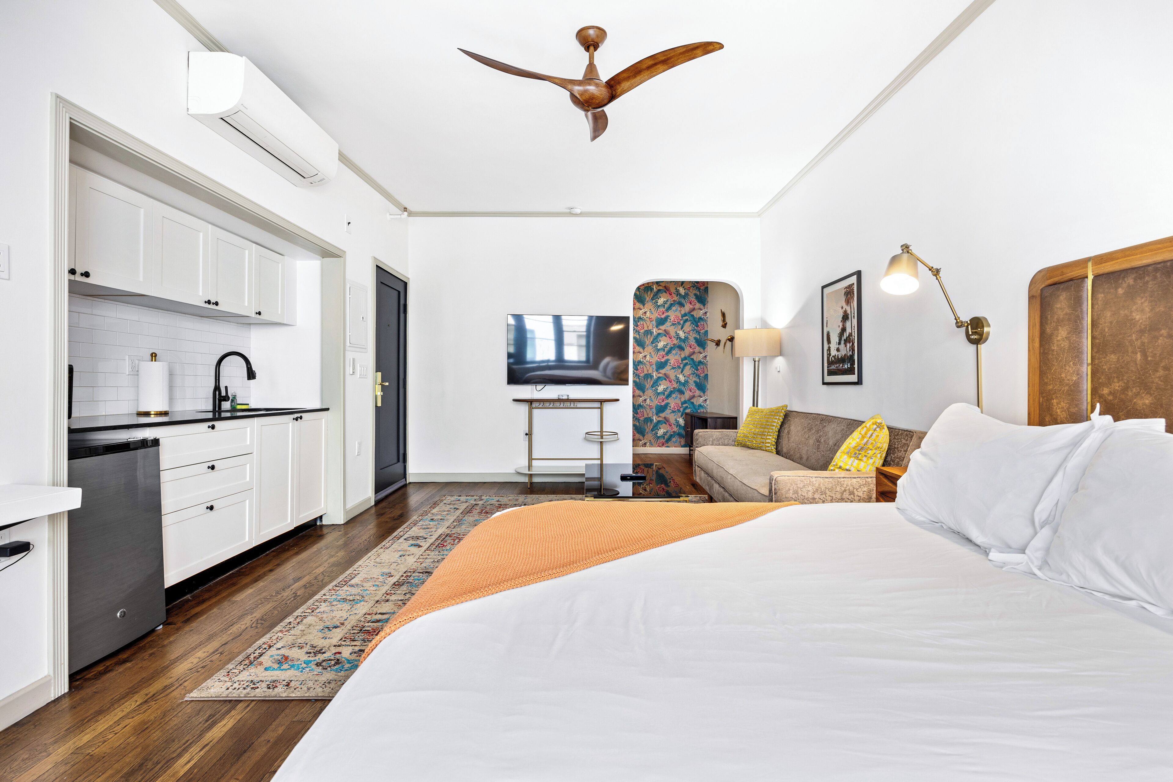 Signature Studio Suite | Individually furnished, desk, laptop workspace, iron/ironing board