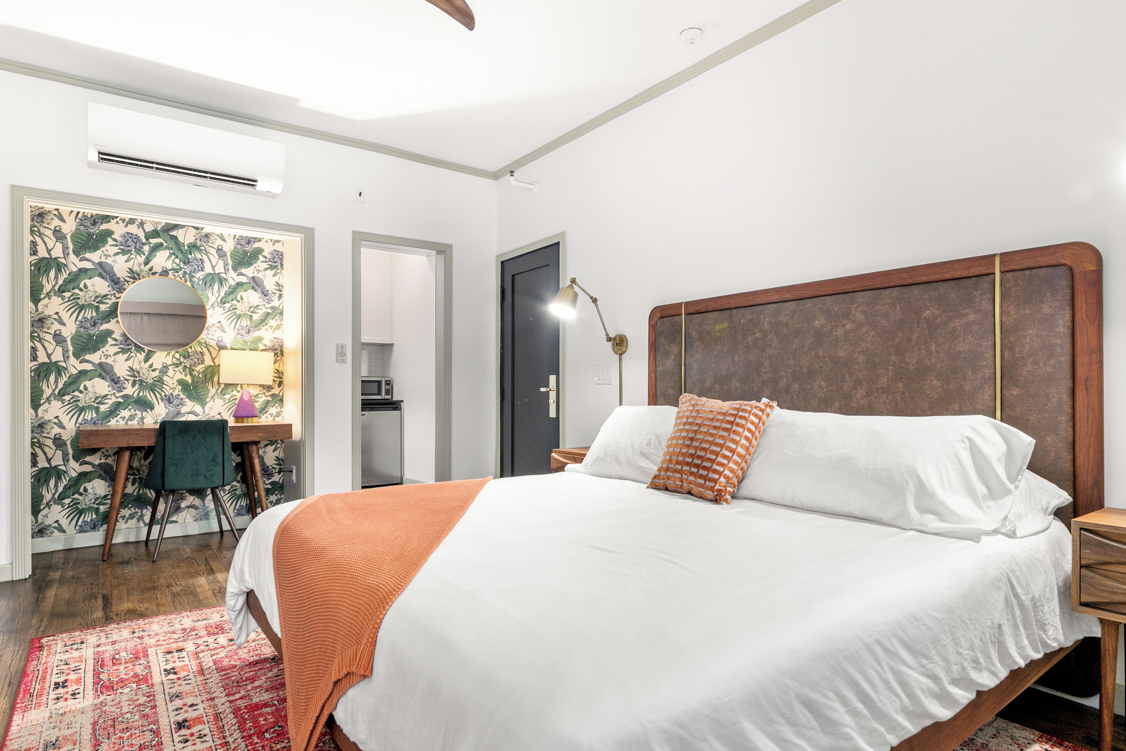 Individually furnished, desk, laptop workspace, iron/ironing board