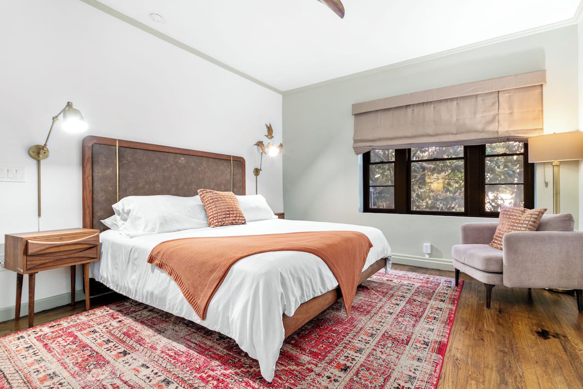 Individually furnished, desk, laptop workspace, iron/ironing board