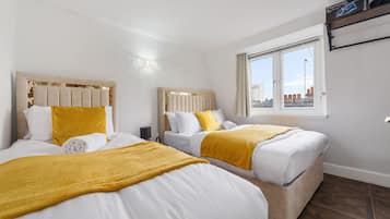 2 slaapkamers, een strijkplank/strijkijzer, gratis wifi, beddengoed