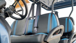 A golf cart interior with blue and black seats, a steering wheel, and a canopy. - Victory Bungalow - 2 bed / 1.5 bath - AC-Affordable-Clean - Sleeps 6+ Avalon, NJ (Avalon)