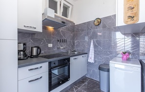 Refrigerador, horno, placa de cocina, lavavajillas