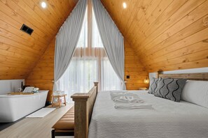 Tabla de planchar con plancha, wifi gratis y ropa de cama
