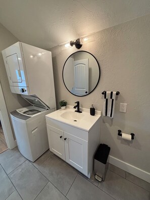 Shower, towels, soap, toilet paper