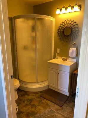 Shower, towels, soap, toilet paper