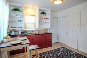 Fridge, microwave, stovetop, coffee/tea maker