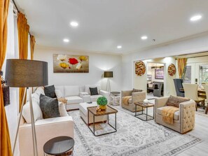 Smart TV, fireplace, books, stereo
