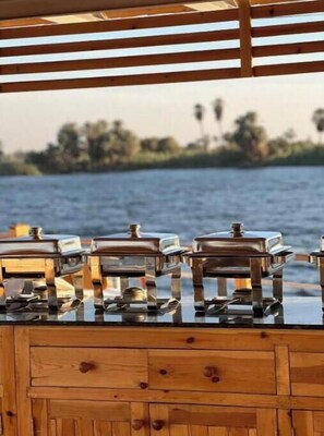 Outdoor dining - Charming 1-bedroom hotel suites in Luxor Governorate with AC 3 (Luxor Governorate)