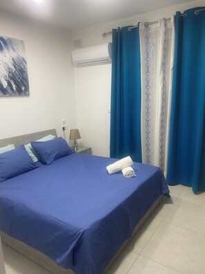 2 habitaciones, tabla de planchar con plancha, wifi y ropa de cama 