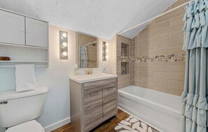Hair dryer, towels, soap, toilet paper