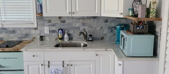 Take it easy at this cozy little getaway in a quiet residential neighborhood