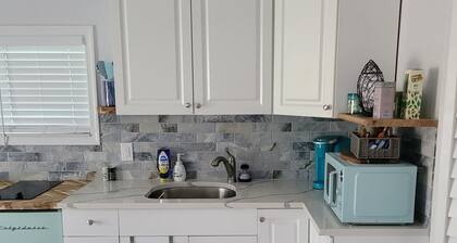 Take it easy at this cozy little getaway in a quiet residential neighborhood