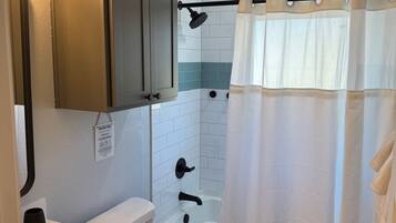 Hair dryer, towels, soap, toilet paper