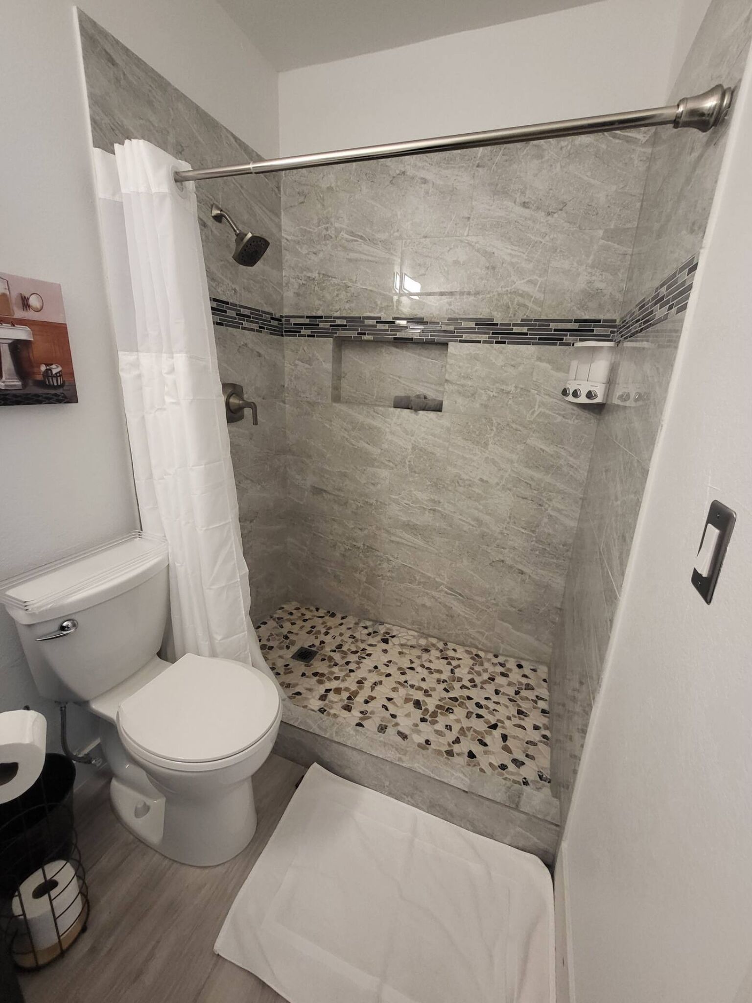 Hair dryer, towels, soap, toilet paper
