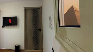 Grand Quadruple Room, 2 Double Beds, Mountain View | Terrace/patio