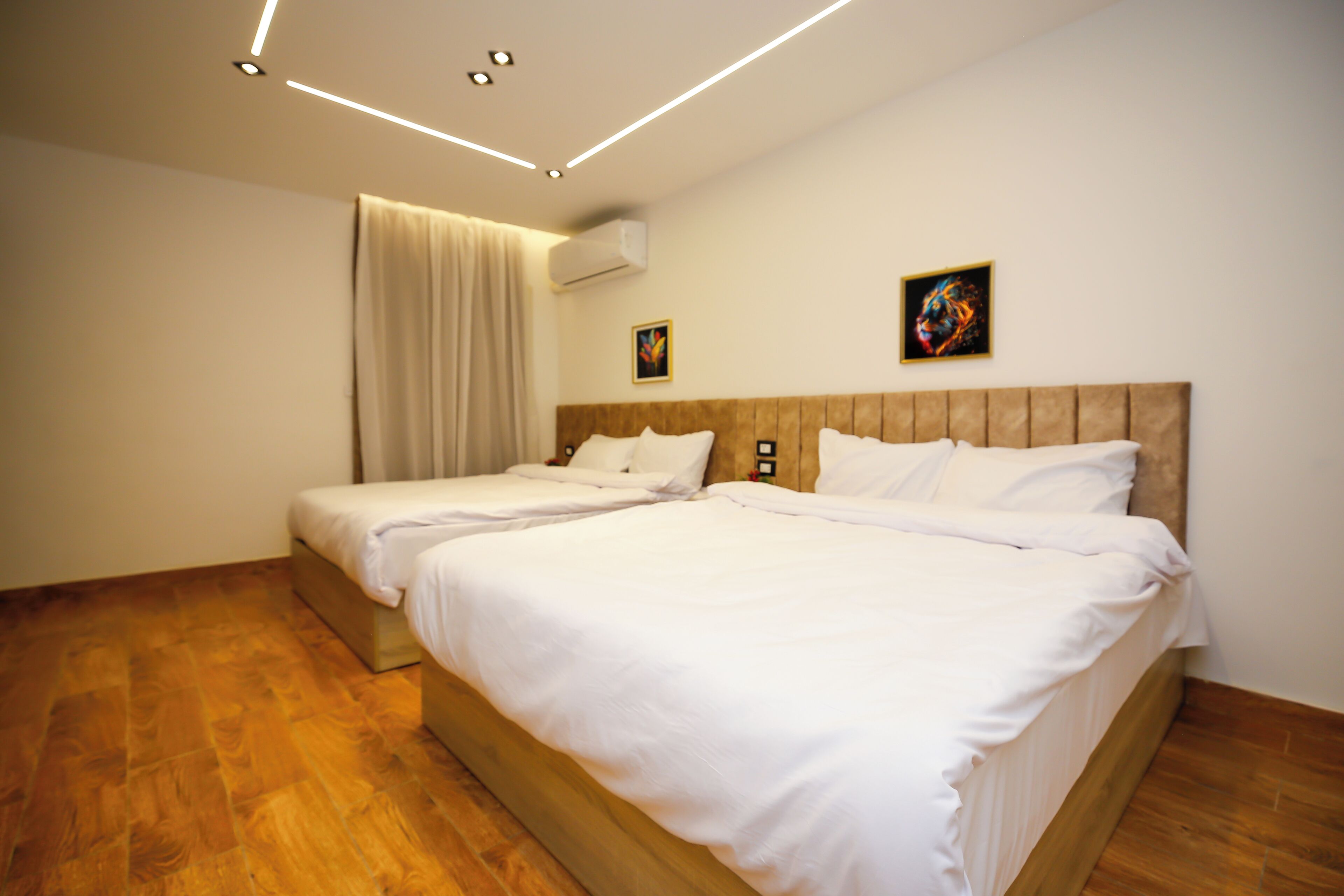 Grand Quadruple Room, 2 Double Beds, Mountain View | In-room safe, individually decorated, individually furnished, desk