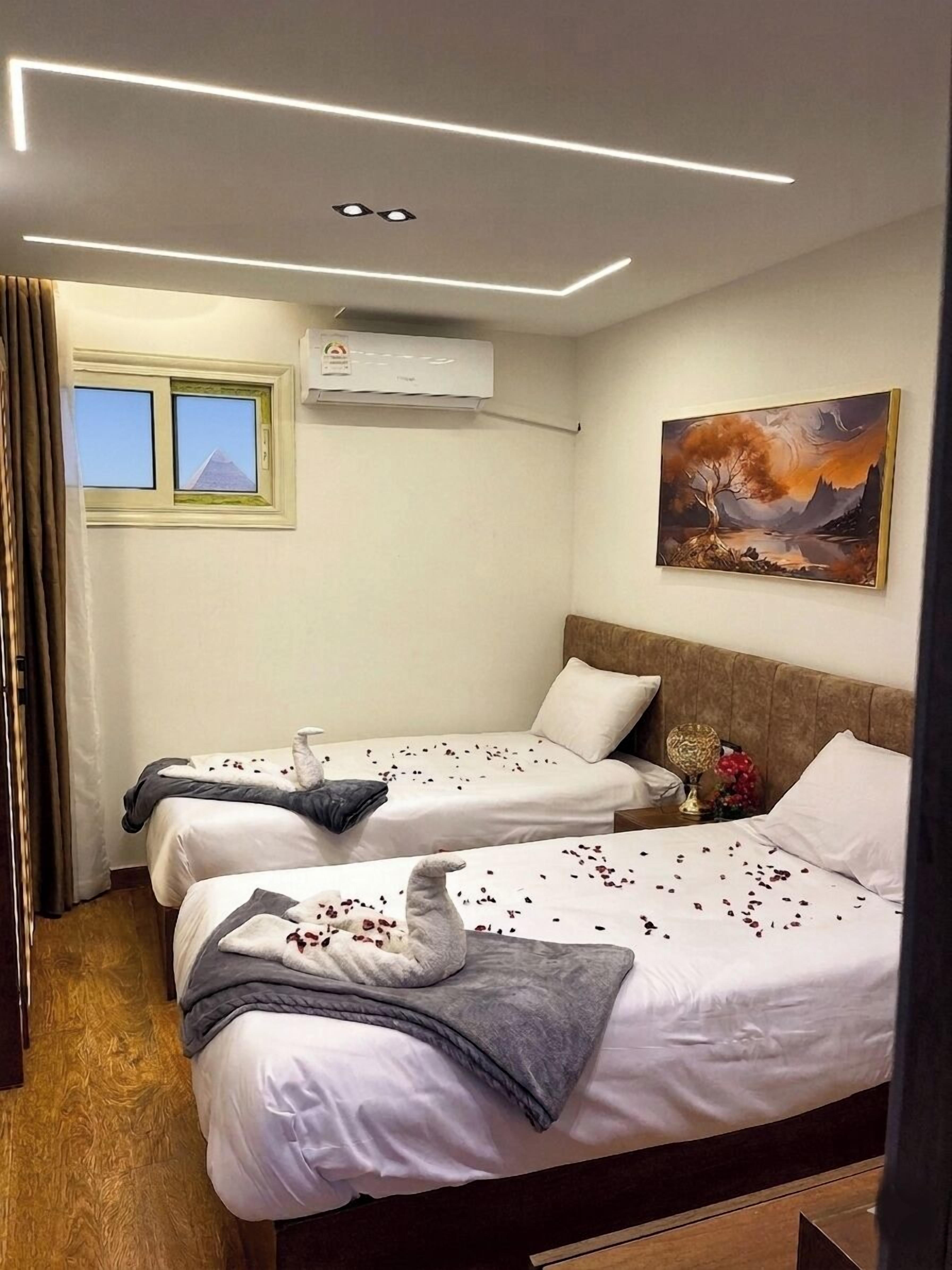 Standard Twin Room | In-room safe, individually decorated, individually furnished, desk