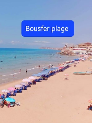 On the beach, beach towels