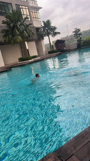 Pool - 3-bedroom condo in awesome Putrajaya with AC, fitness room (Putrajaya)