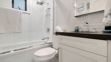 Hair dryer, towels, soap, toilet paper