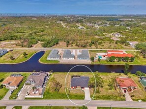 Exterior - Beautifully updated canal waterfront 3/2 house with heated pool in Rotonda West. (Rotonda West)