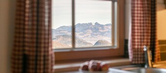 Dreamlike mountain hut with large garden