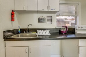 Fridge, microwave, stovetop, cookware/dishes/utensils