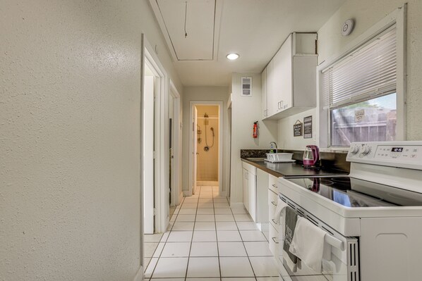 Fridge, microwave, stovetop, cookware/dishes/utensils