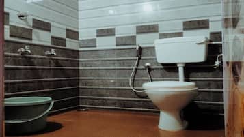 Deluxe Room | Bathroom | Slippers