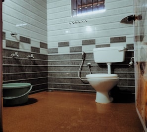 Deluxe Room | Bathroom | Slippers