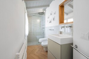 Hair dryer, bidet, towels